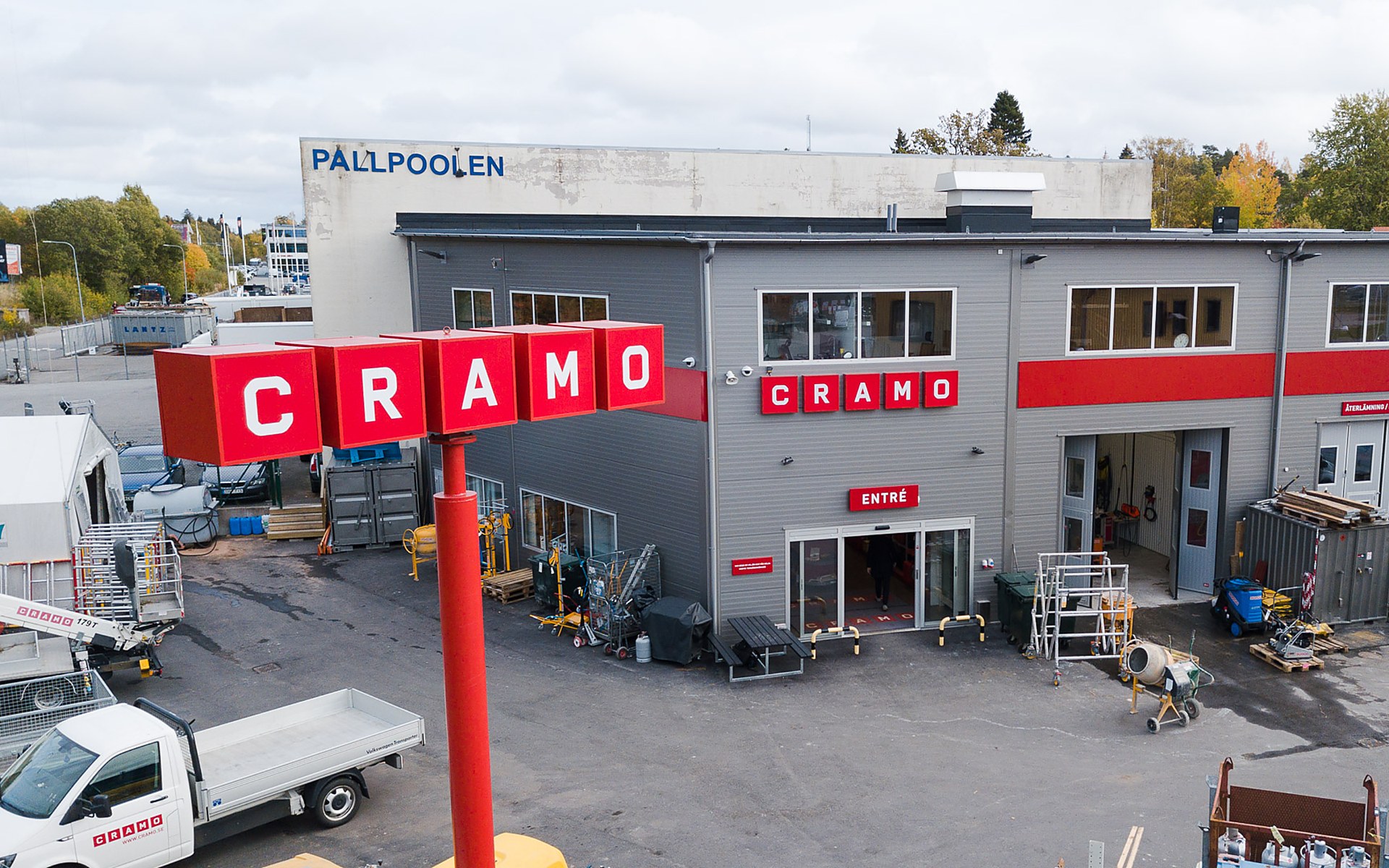 Cramo equipment rental depot, aerial view of yard and vehicles